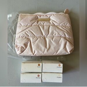 - NWT Rare Beauty By Selena Gomez Positive Highlighter and Puffy Make Up bag